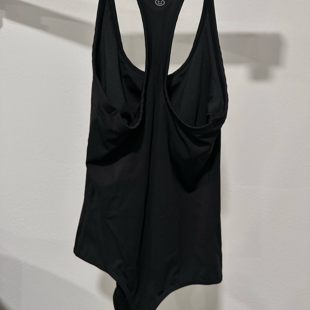 Gilly Hicks Black body suit.